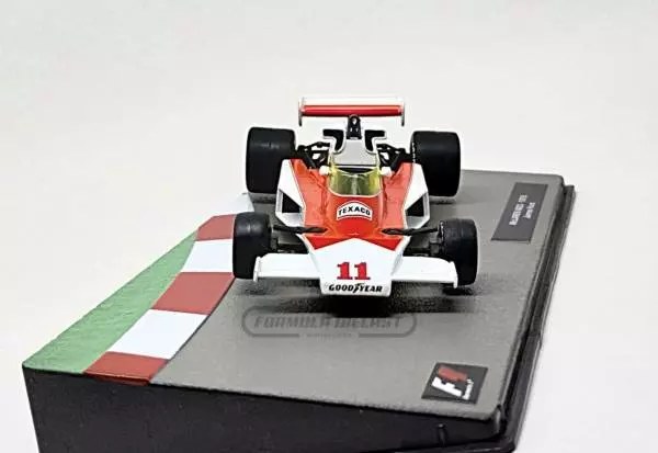 Miniatura de carro McLaren M23 #11 James Hunt, Campeão Mundial F1 1976, escala 1:43, marca Altaya