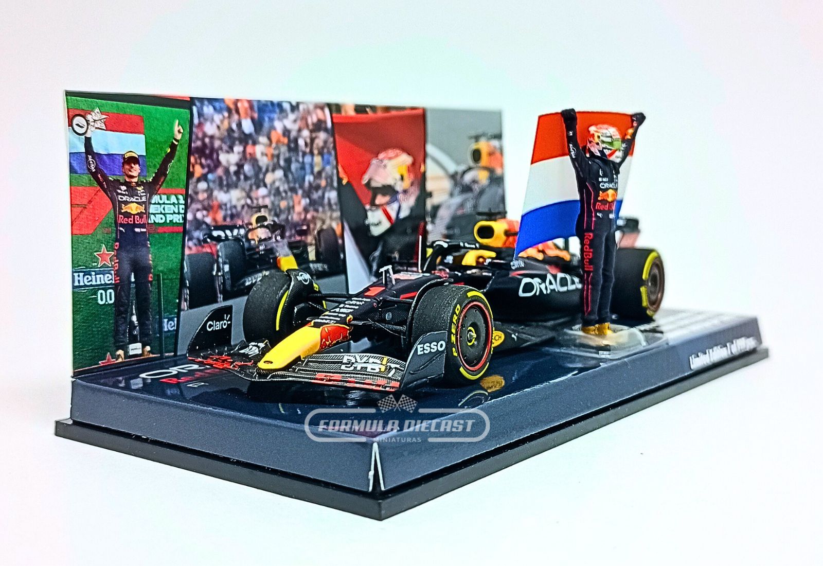 Miniatura de carro Red Bull RB18 #1 M. Verstappen, 1º lugar GP da Holanda, Campeão Mundial F1 2022, escala 1:43, marca Minichamps