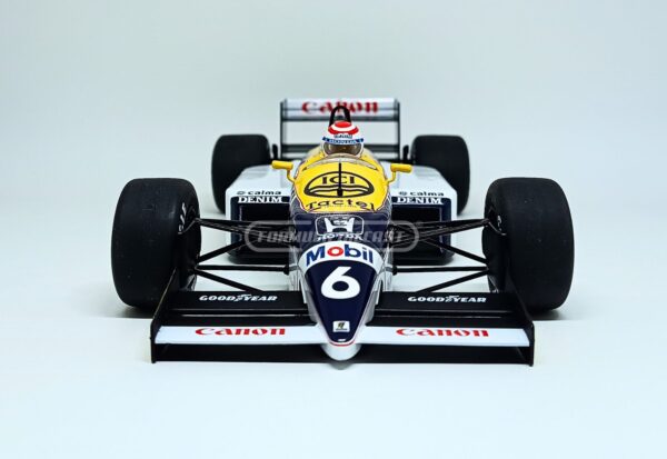 Miniatura de carro Williams FW11 #6 pilotado por Nelson Piquet, vencedor GP Brasil F1 1986, escala 1:18, marca MCG