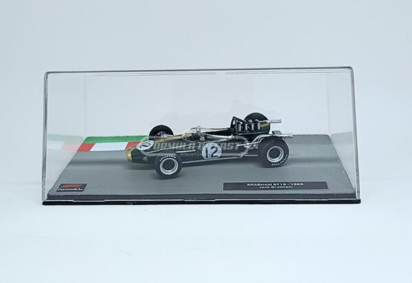 Miniatura de carro Brabham BT19 #12 pilotado por Jack Brabham, campeão mundial F1 1966, escala 1:43, marca Altaya