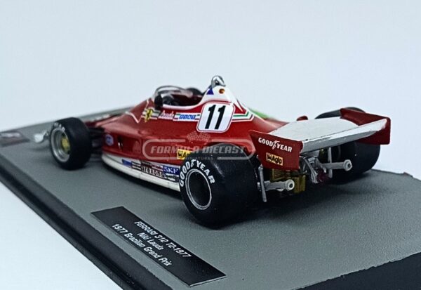 Miniatura de carro Ferrari 312T2 #11 pilotado por Niki Lauda no GP do Brasil, campeão mundial F1 1977, escala 1:43, marca Altaya