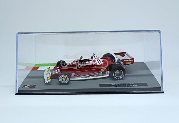 Miniatura de carro Ferrari 312T2 #11 pilotado por Niki Lauda no GP do Brasil, campeão mundial F1 1977, escala 1:43, marca Altaya