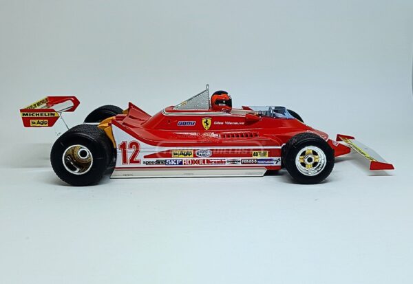 Miniatura de carro Ferrari 312T4 #12 Gilles Villeneuve, vencedor do GP de Long Beach-US, F1 1979, escala 1:18, marca Bburago
