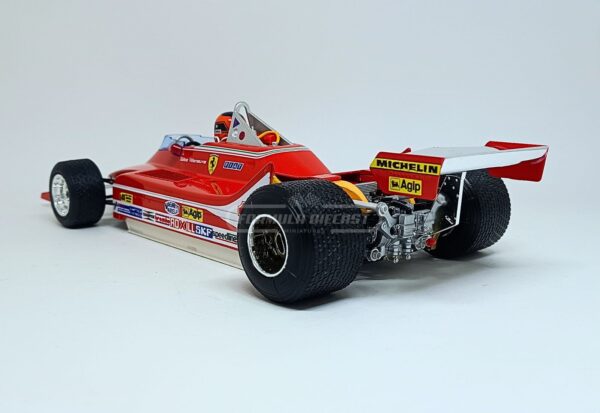 Miniatura de carro Ferrari 312T4 #12 Gilles Villeneuve, vencedor do GP de Long Beach-US, F1 1979, escala 1:18, marca Bburago