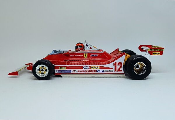 Miniatura de carro Ferrari 312T4 #12 Gilles Villeneuve, vencedor do GP de Long Beach-US, F1 1979, escala 1:18, marca Bburago