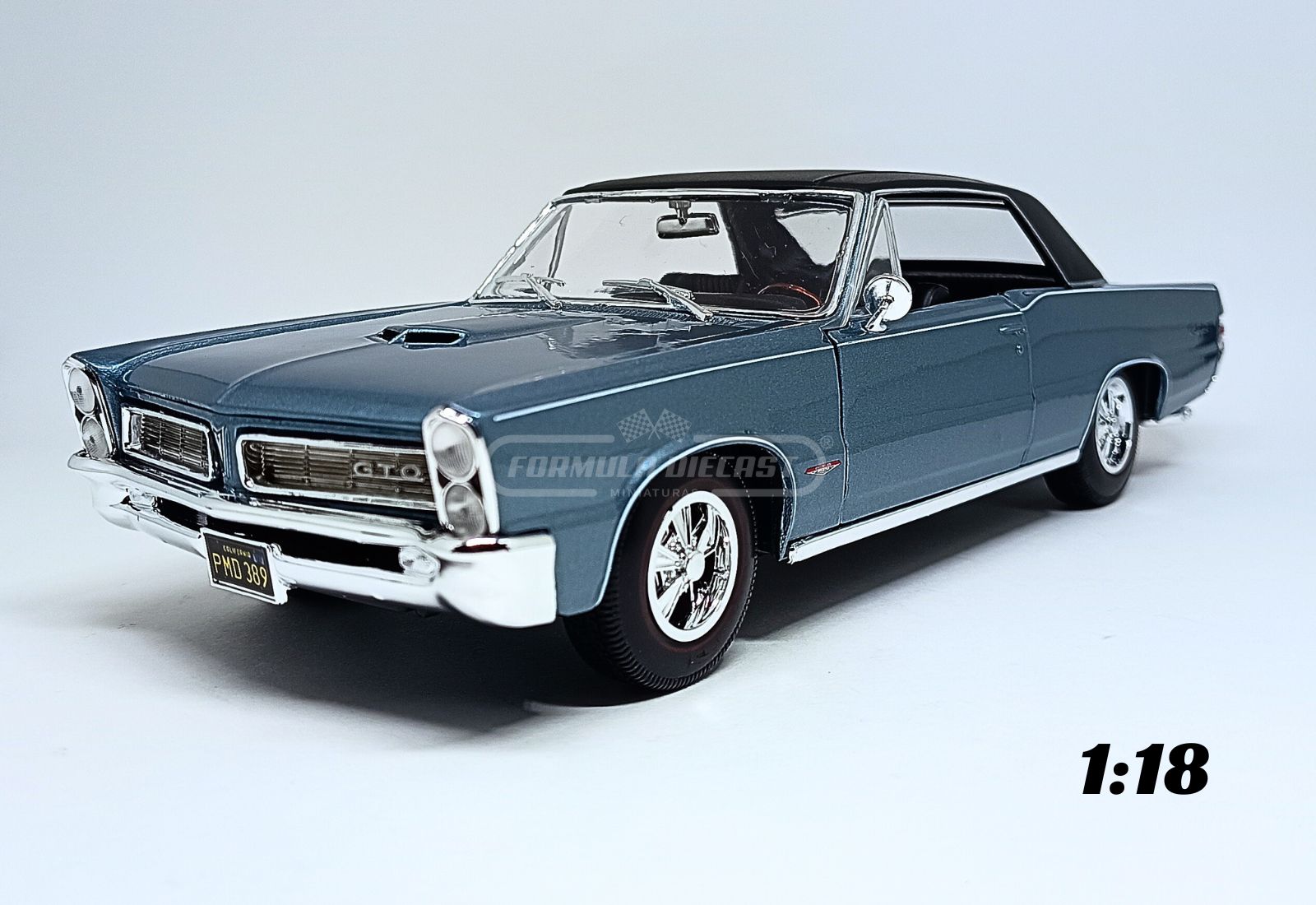 Miniatura de carro Pontiac GTO Hurst 1965, cor Azul Metálico , escala 1:18, marca Maisto