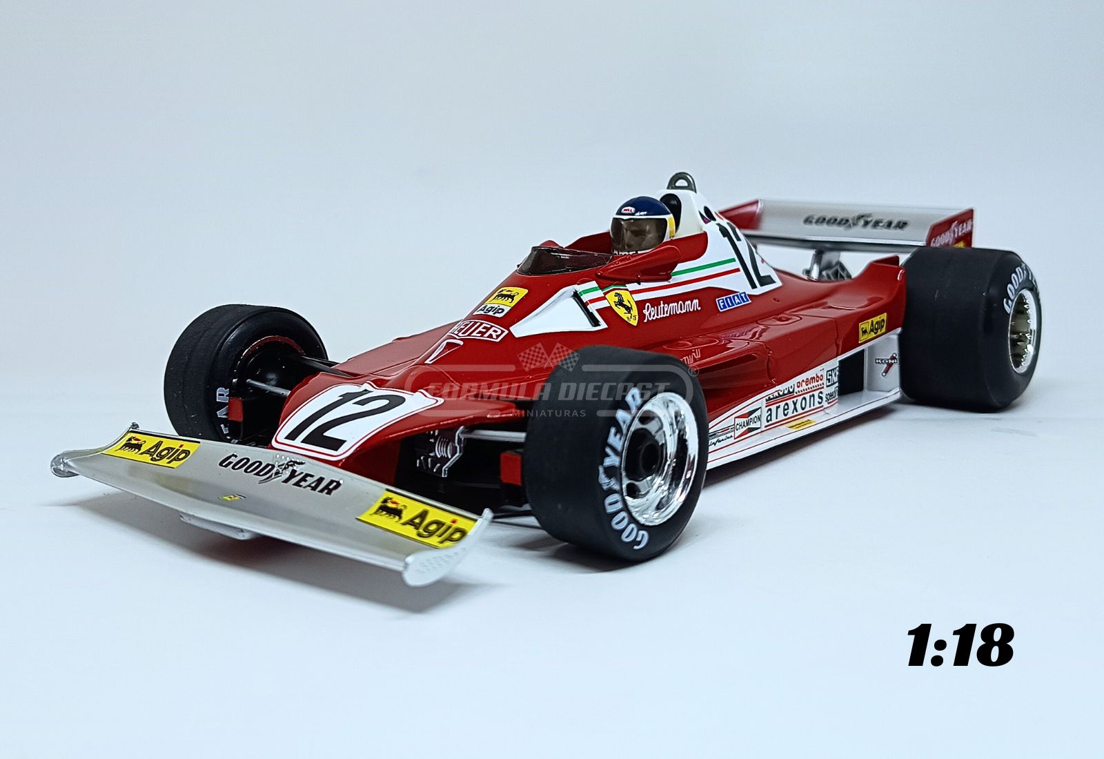 Miniatura de carro Ferrari 312 T2B #12 Carlos Reutemann, F1 1977, escala 1:18, marca MCG